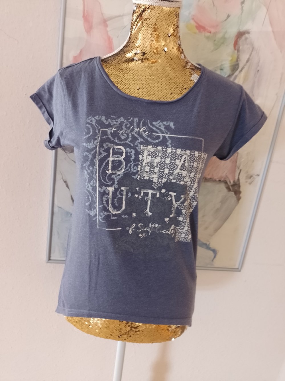 T-Shirt . Baumwolle + Polyester.