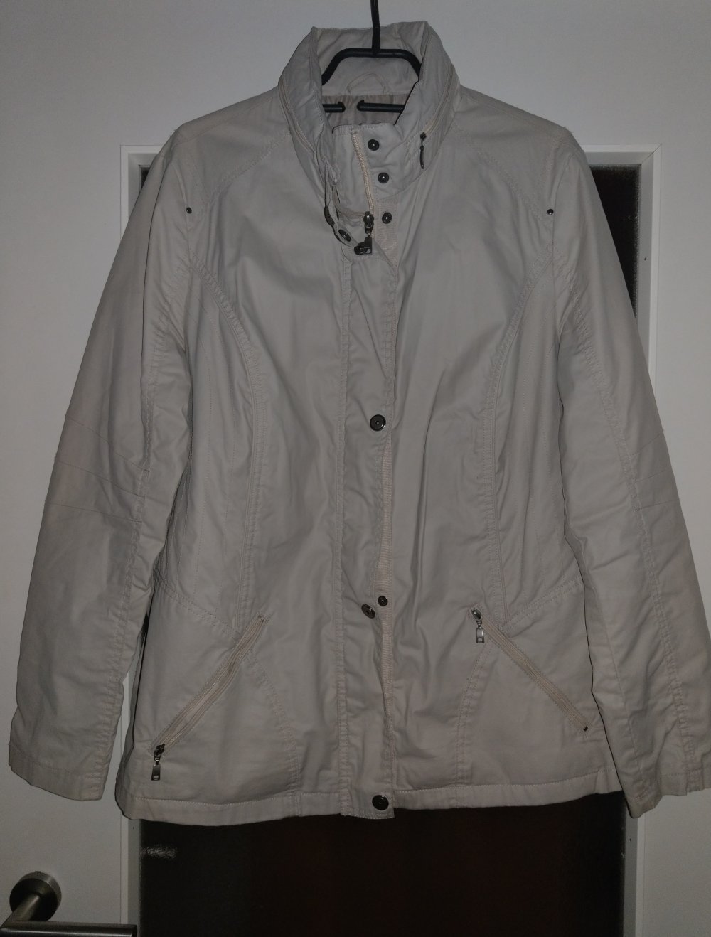 Neue Regenjacke in 44