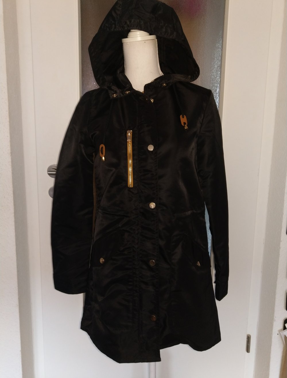 Neuer Regenmantel in S