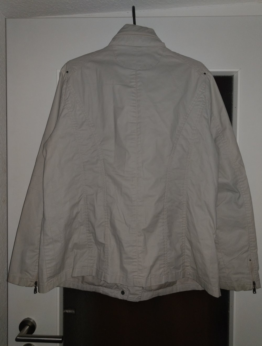 Neue Regenjacke in 44