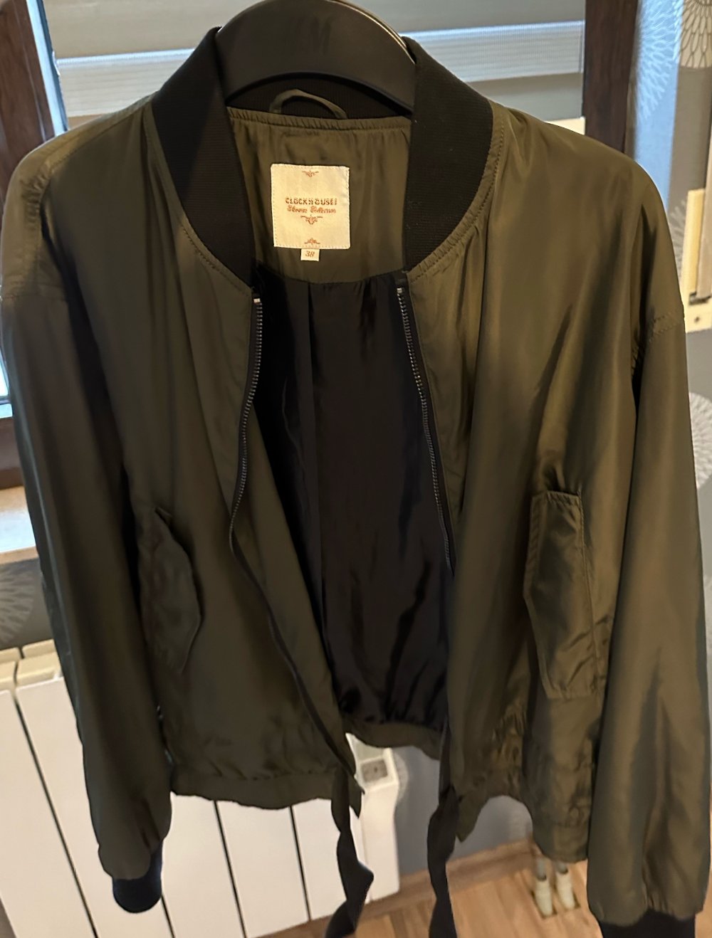 Grüne Jacke zu verkaufen