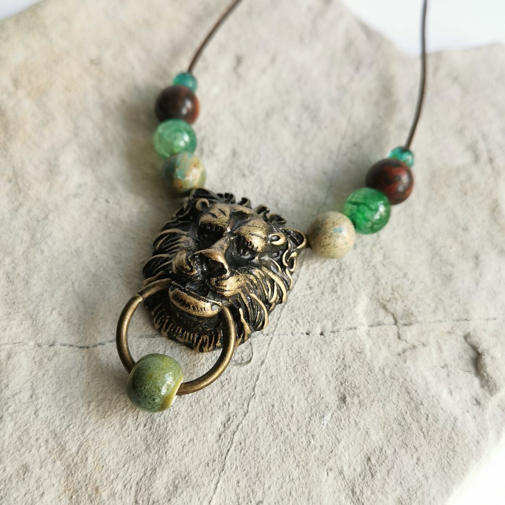 Löwe Bronze Kette Lederband keramik Perlen