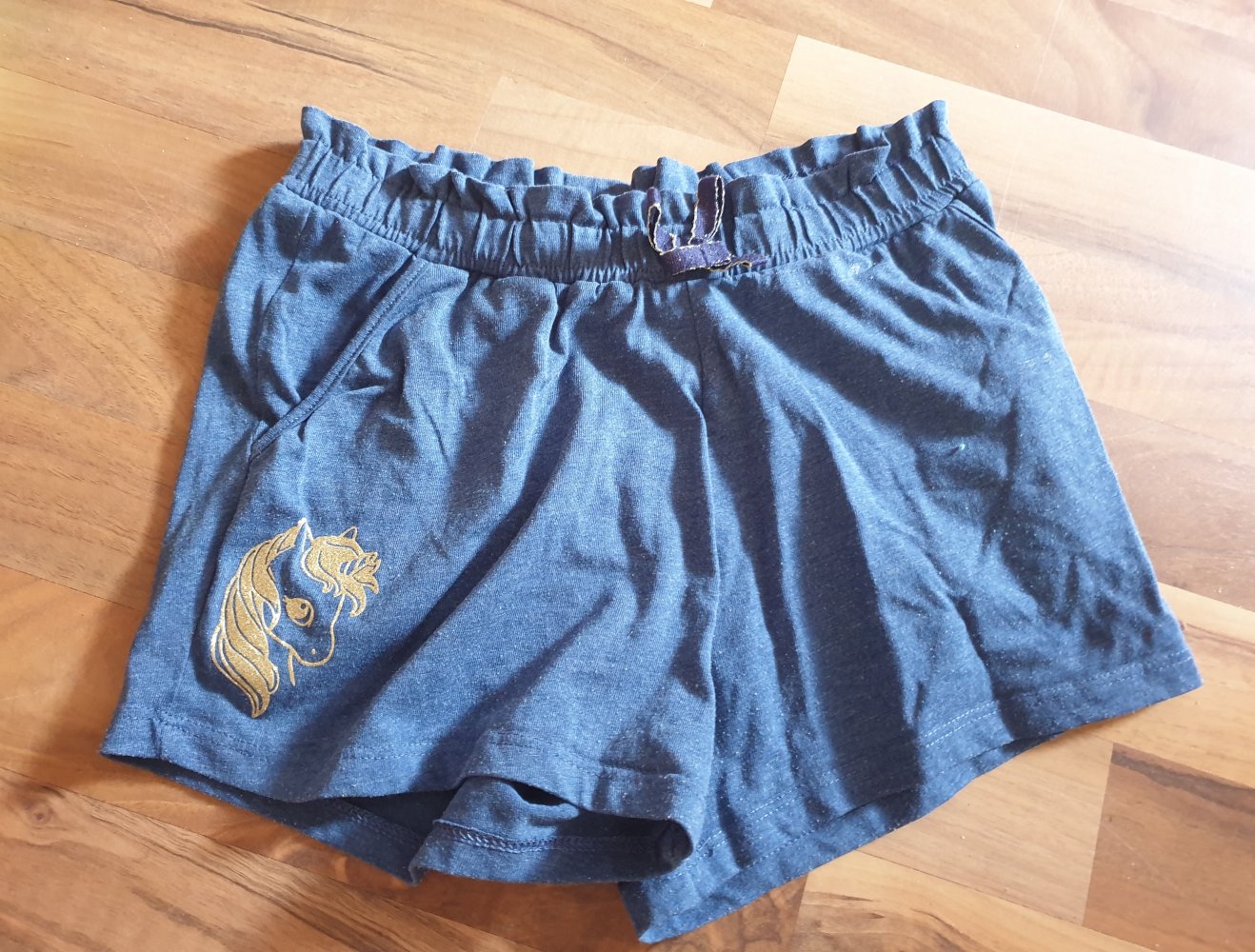 Shorts blau 134 140 Einhorn gold