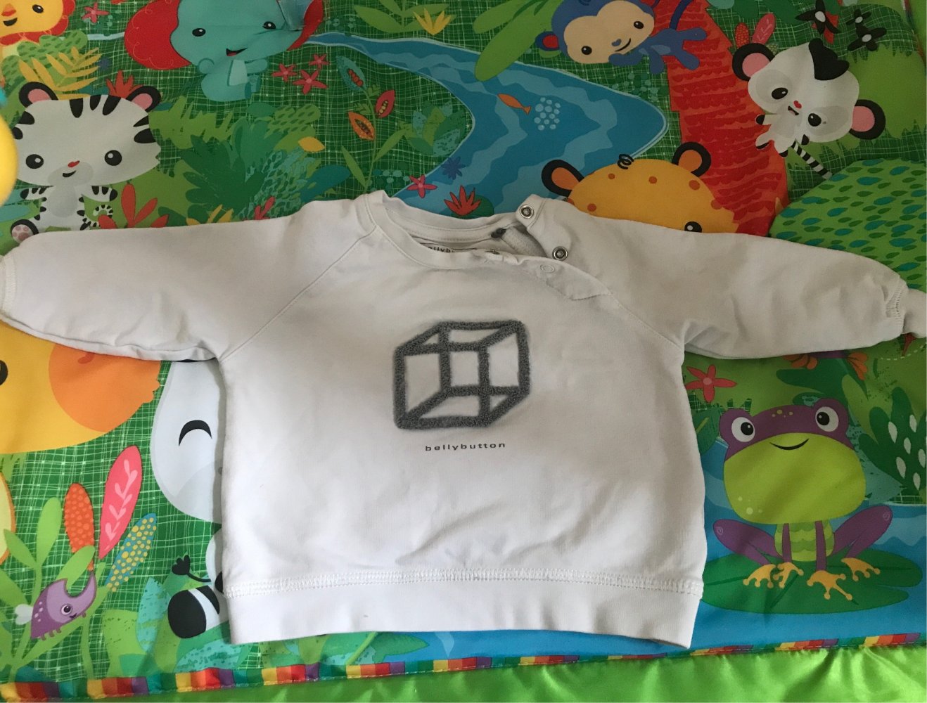 Weißer Babypullover