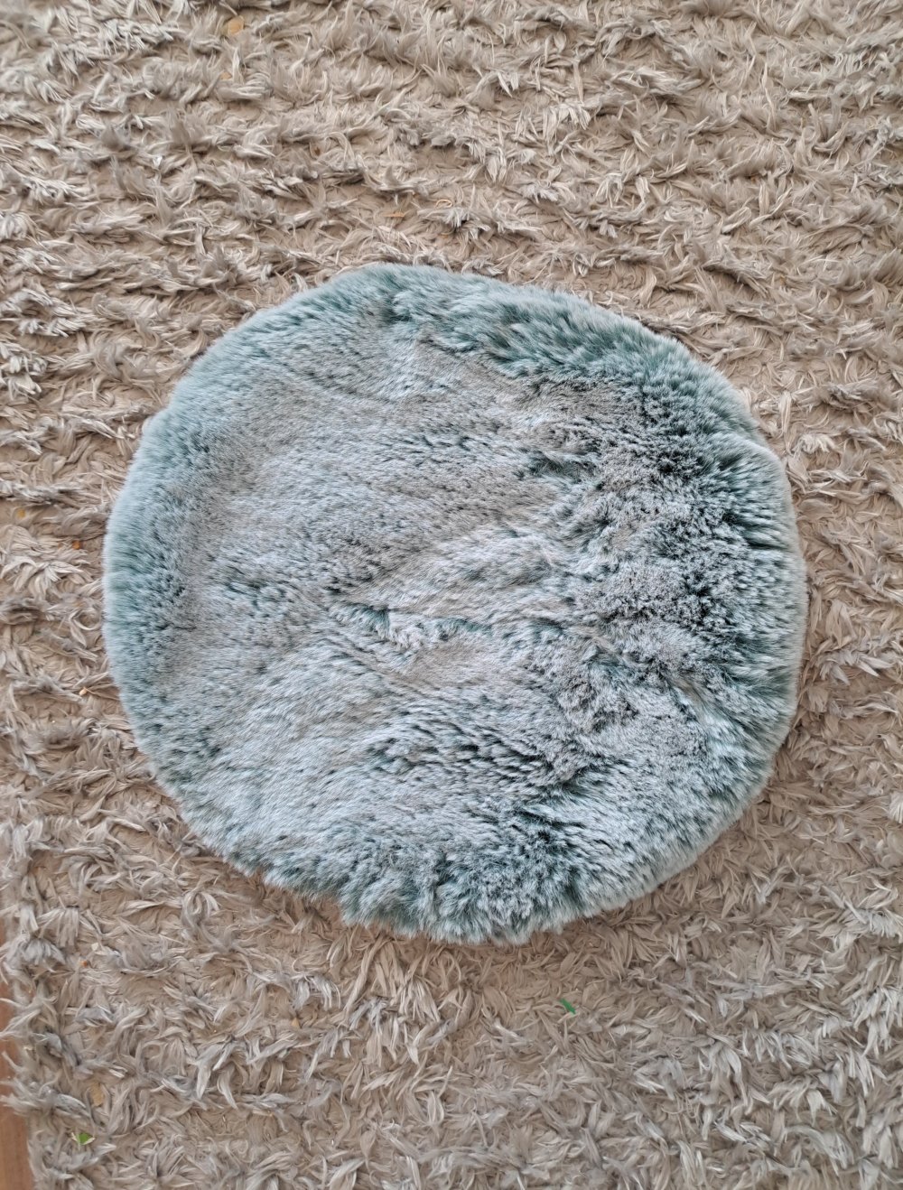 Fellkissen türkis zu verkaufen