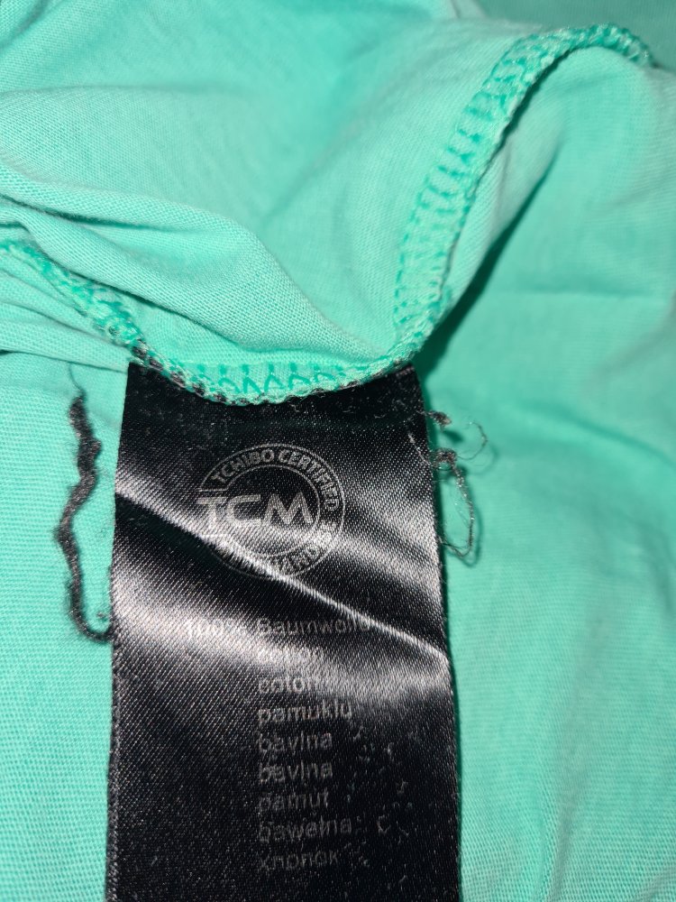 Mintgrünes T-Shirt von TCM mit Aufdruck