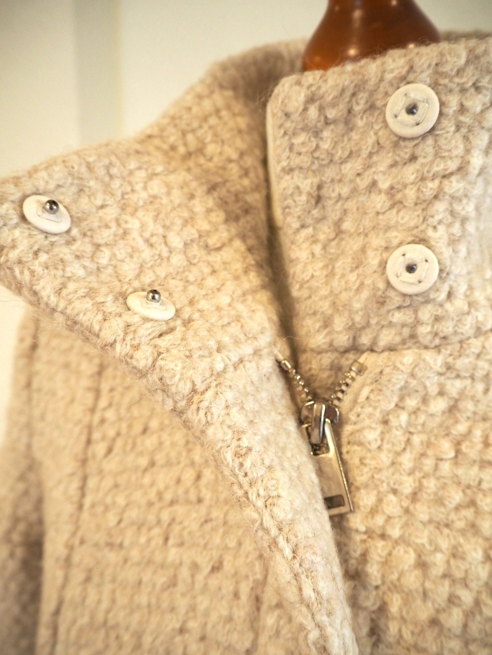 Eleganter Bouclé Wollmantel