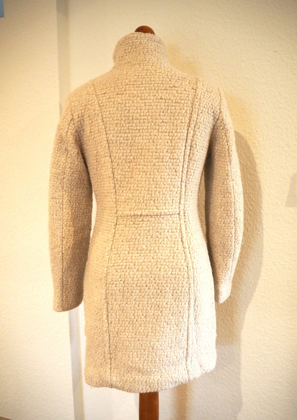 Eleganter Bouclé Wollmantel