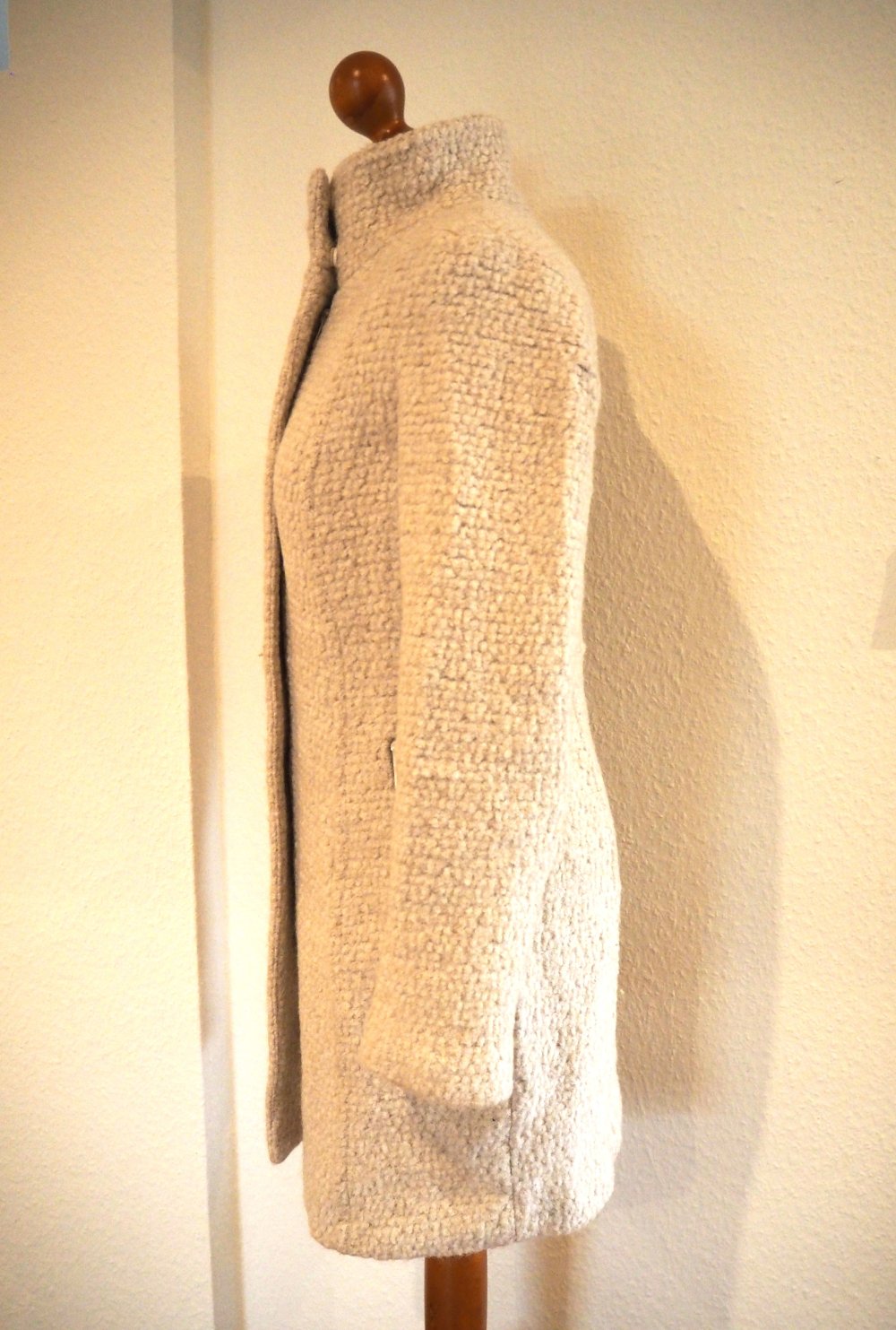 Eleganter Bouclé Wollmantel