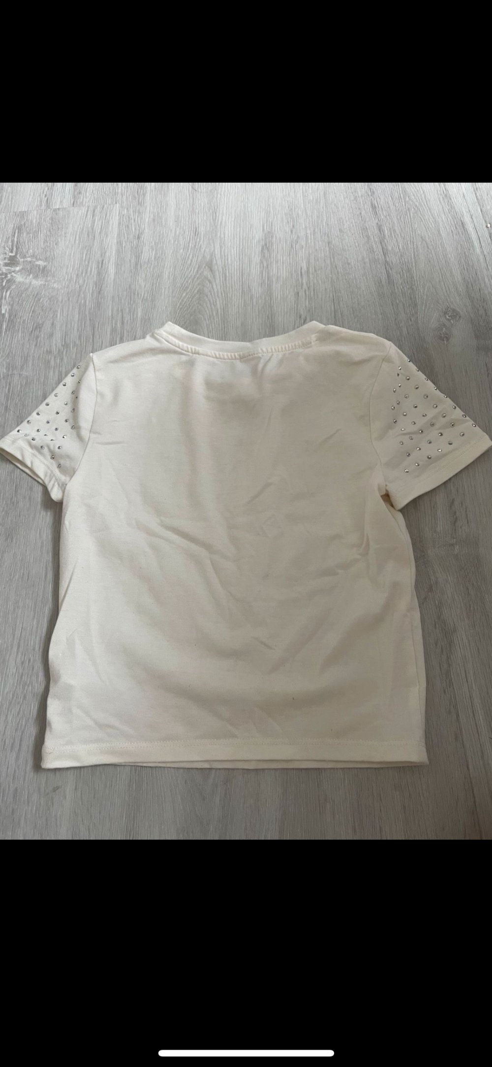 verschiedene Oberteile von H&M Mädchen