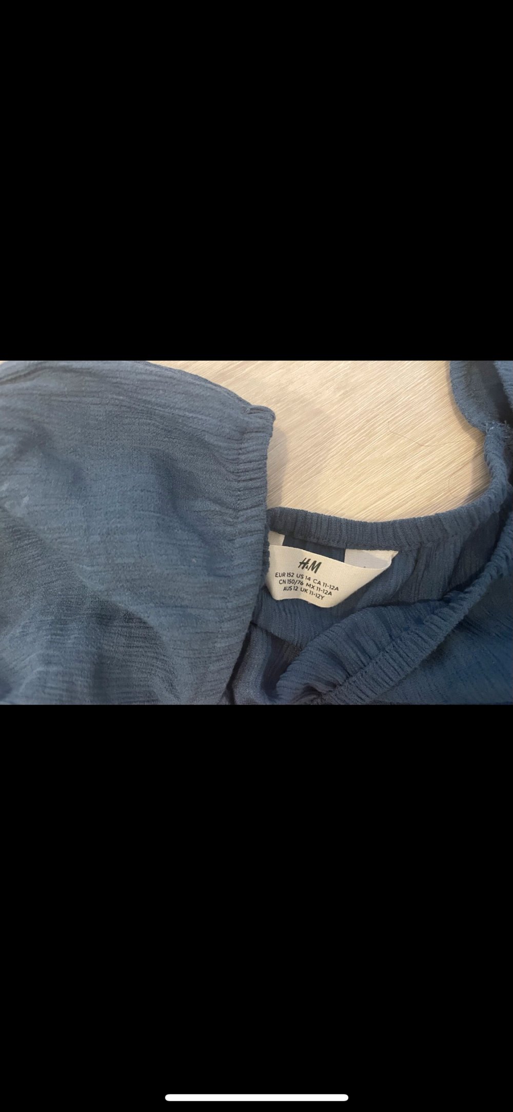 verschiedene Oberteile von H&M Mädchen