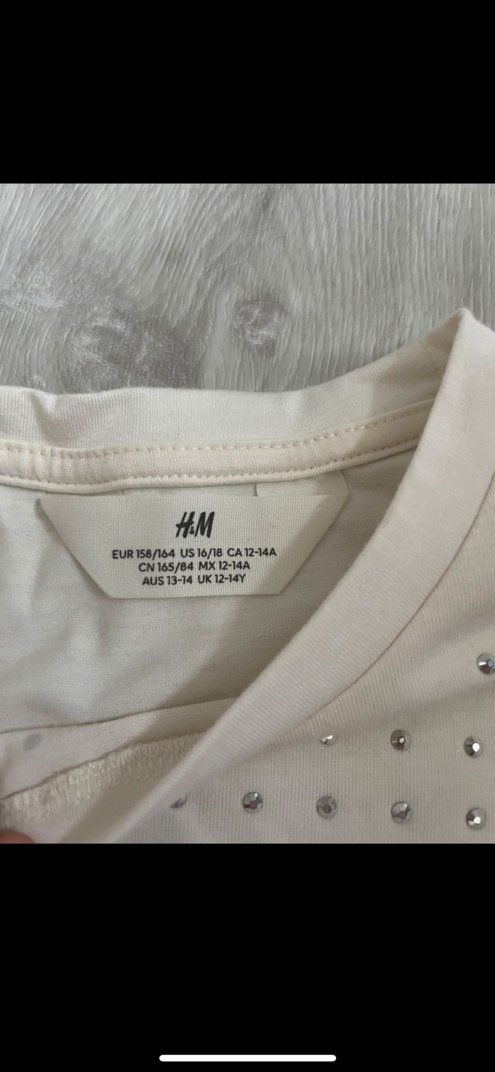 verschiedene Oberteile von H&M Mädchen