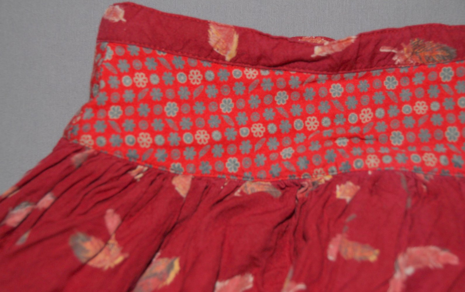 Mexx Rock Röckchen 98 104 Kleid Feder Blumen bordo rot w Neu