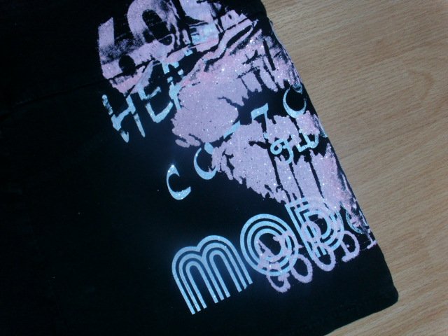 Minirock von A&M, schwarz mit Motiv, Gr. 40 mit Etikett