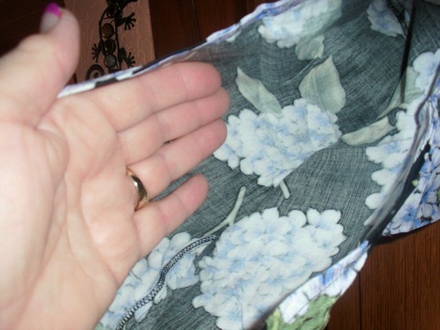 Blusenjacke von Minkpink, schwarz mit Motiv, Gr. 44/46 mit Etikett