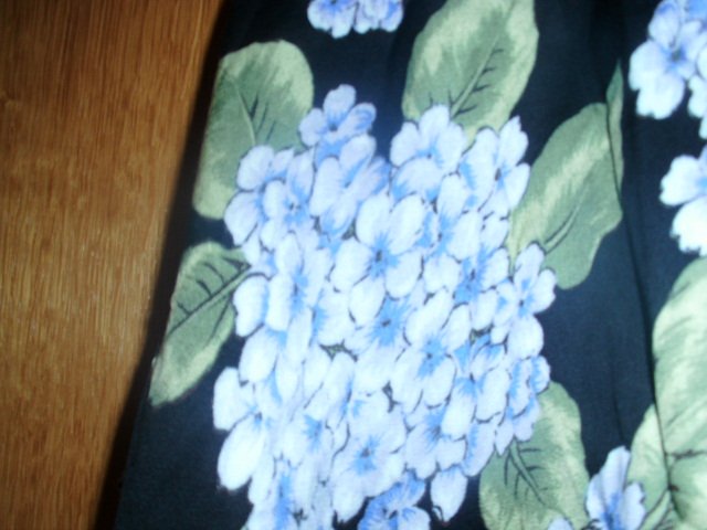 Blusenjacke von Minkpink, schwarz mit Motiv, Gr. 44/46 mit Etikett