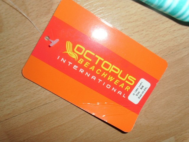 Tankinioberteil von Octopus, türkis-weiß, Gr. 50 mit Etikett