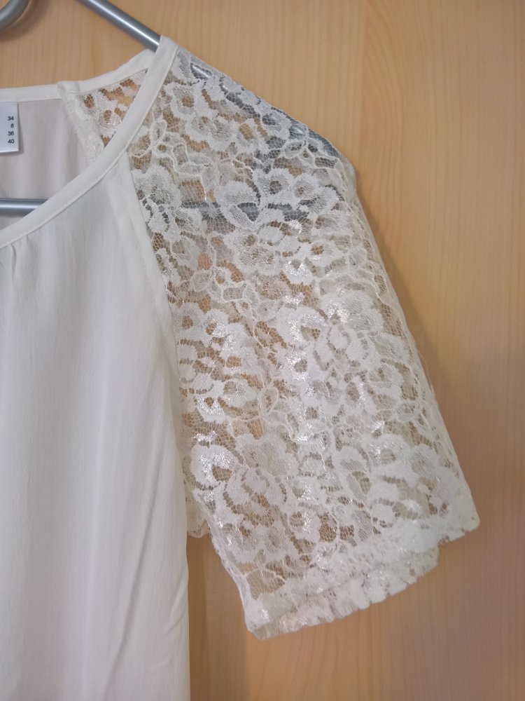 ungetragenes wollweißes Blusenshirt Gr. 34