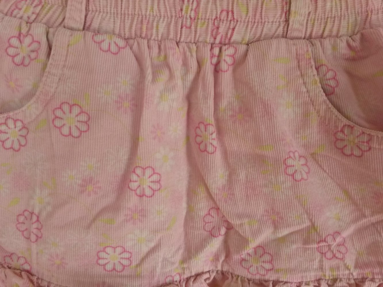 rosa Cordrock mit Blumen in Gr. 80