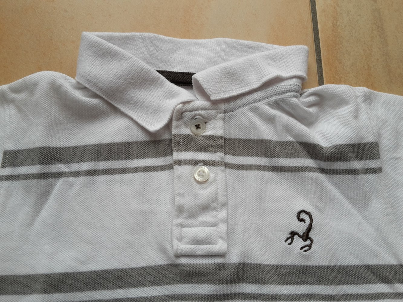 weiß-grau gestreiftes Poloshirt in Gr. 86 von Palomino