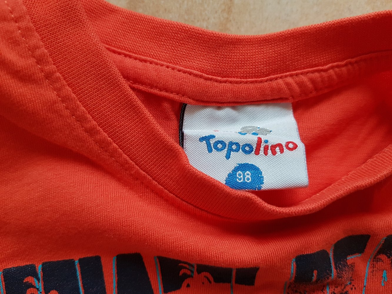 oranges Achselshirt in Gr. 98