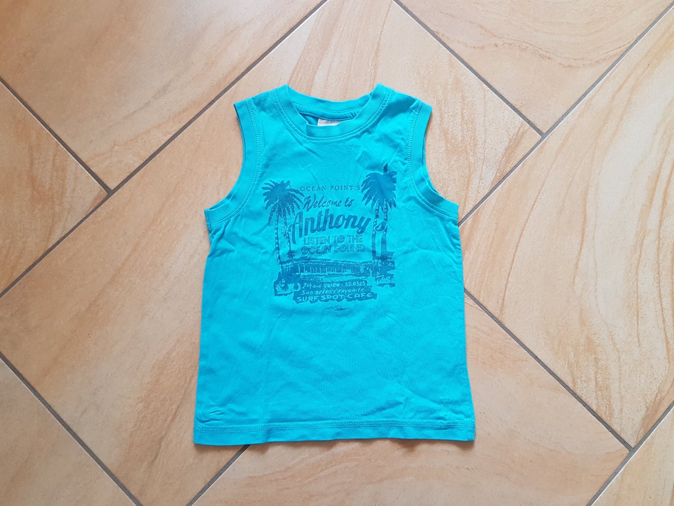 türkises Achselshirt in Gr. 98 