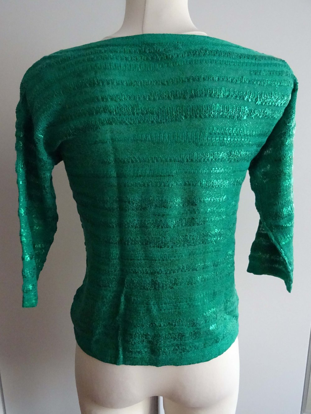 grüner Pullover