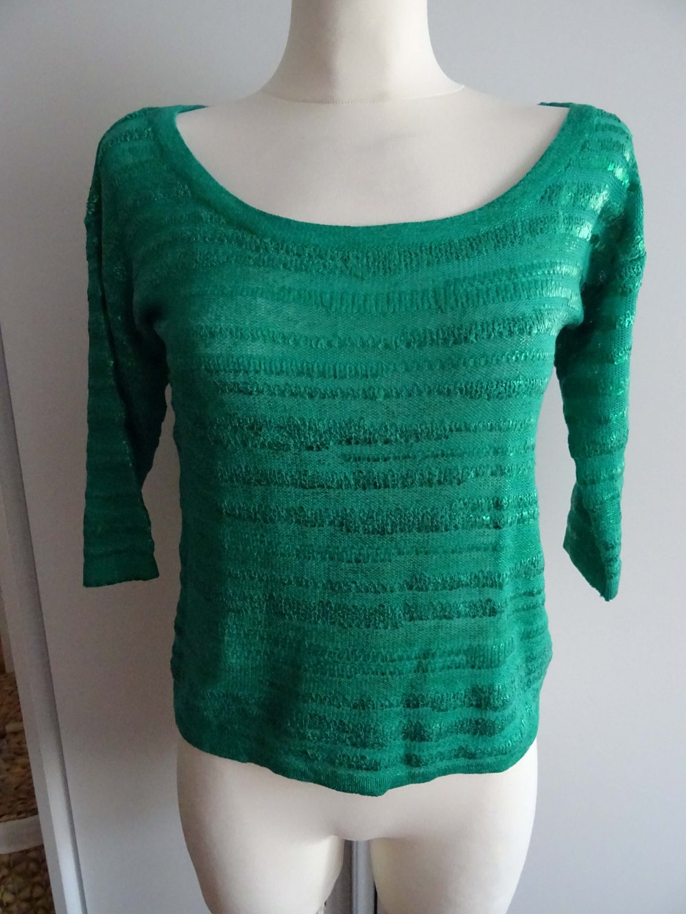 grüner Pullover