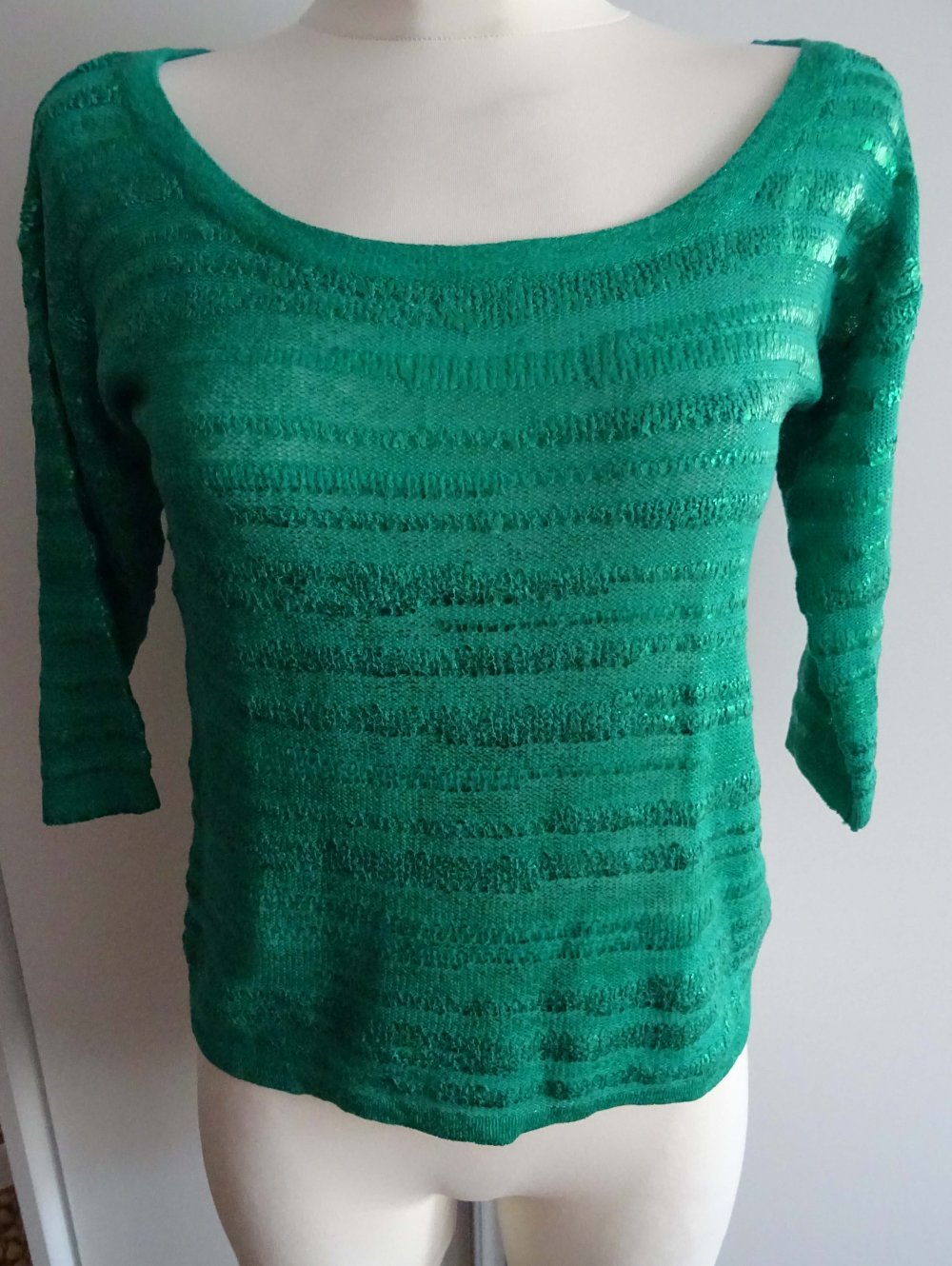 grüner Pullover