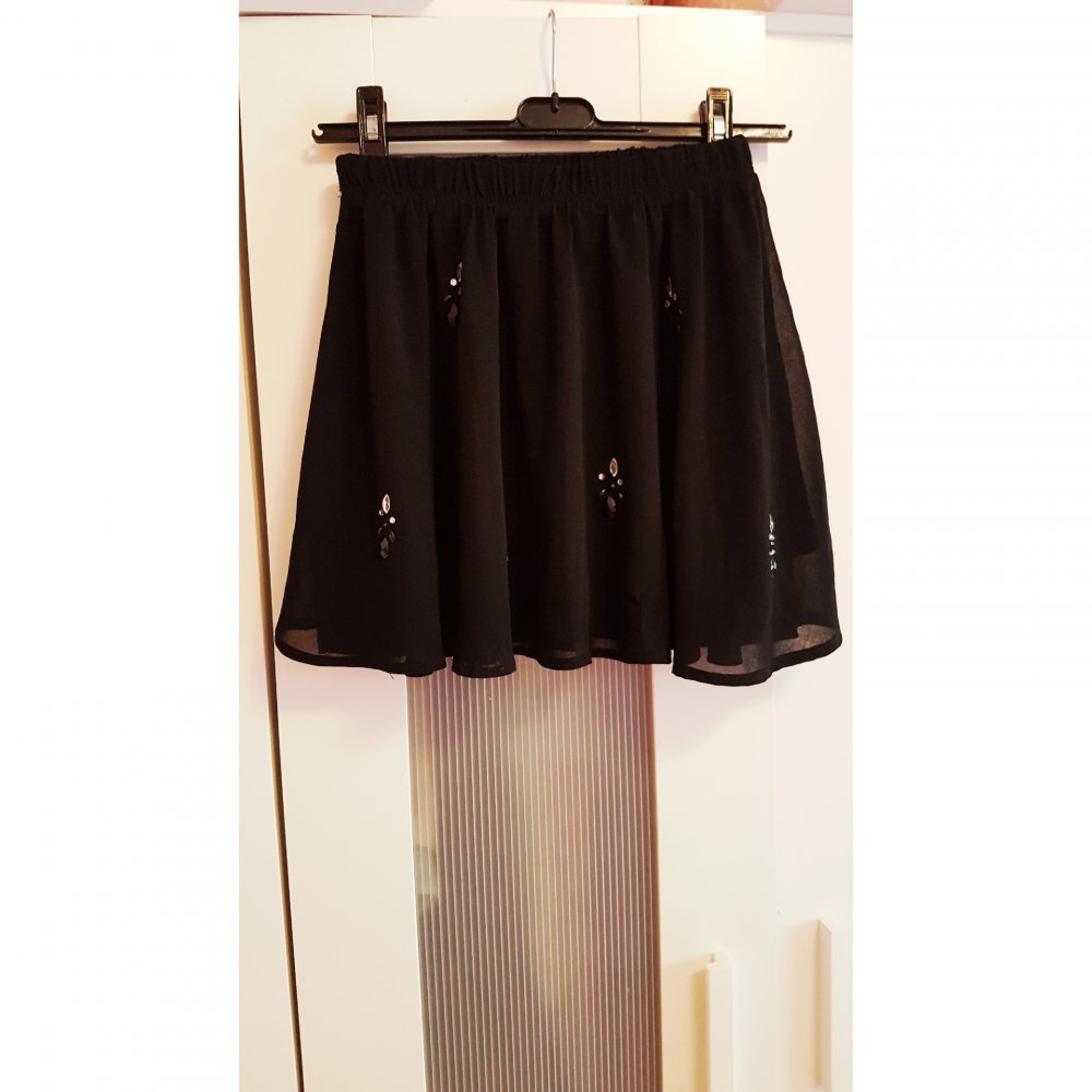 Eleganter Faltenrock