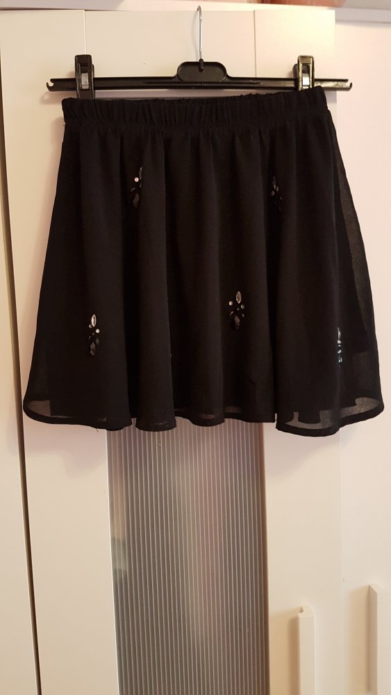 Eleganter Faltenrock