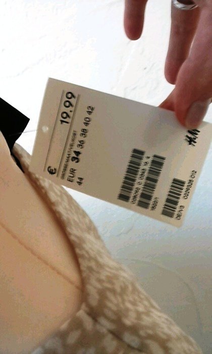 Schlichte, gesprenkelte H&M Damen Langarm Bluse in beige und weiß Gr. XS S