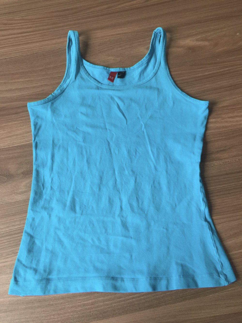 Top in türkis Gr. 38