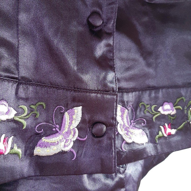 Glänzende lila Weste