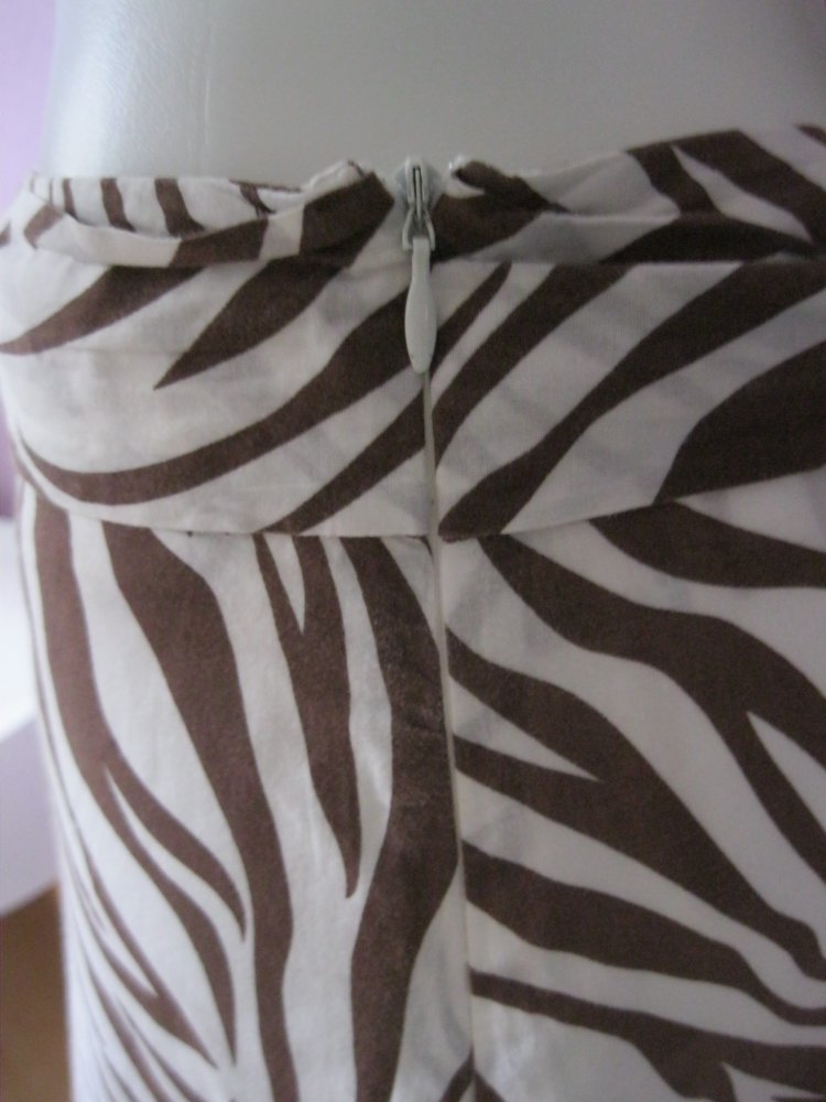 Falten-Rock # Ytrend # Safari-Muster # Creme/Braun # 100% Baumwolle # 38