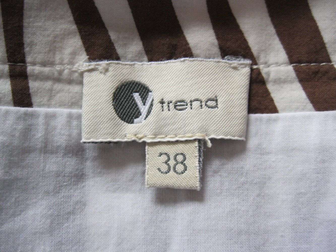 Falten-Rock # Ytrend # Safari-Muster # Creme/Braun # 100% Baumwolle # 38