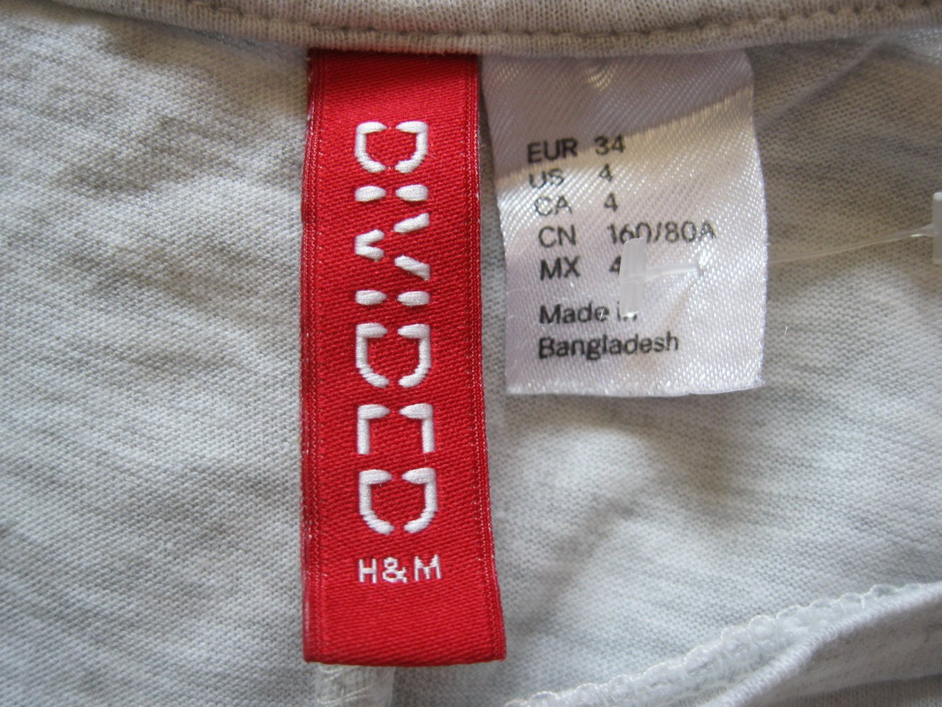 Long-Top # Ärmellos # Divided # Hellgrau meliert # 34