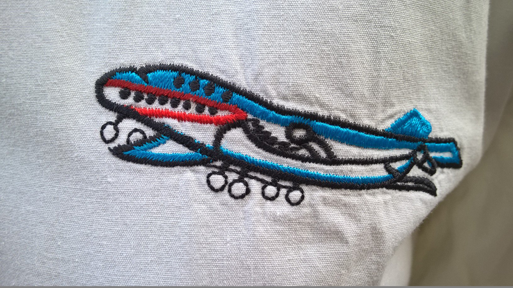 BLUSE Gr.36 IN WEISS LANGARM mit STICKEREI FLUGZEUG 70er TRUE VINTAGE