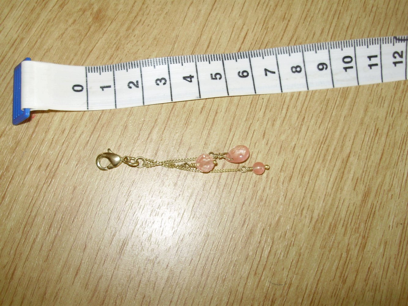 Pilgrim Anhänger golden lang rosefarbene Perlen