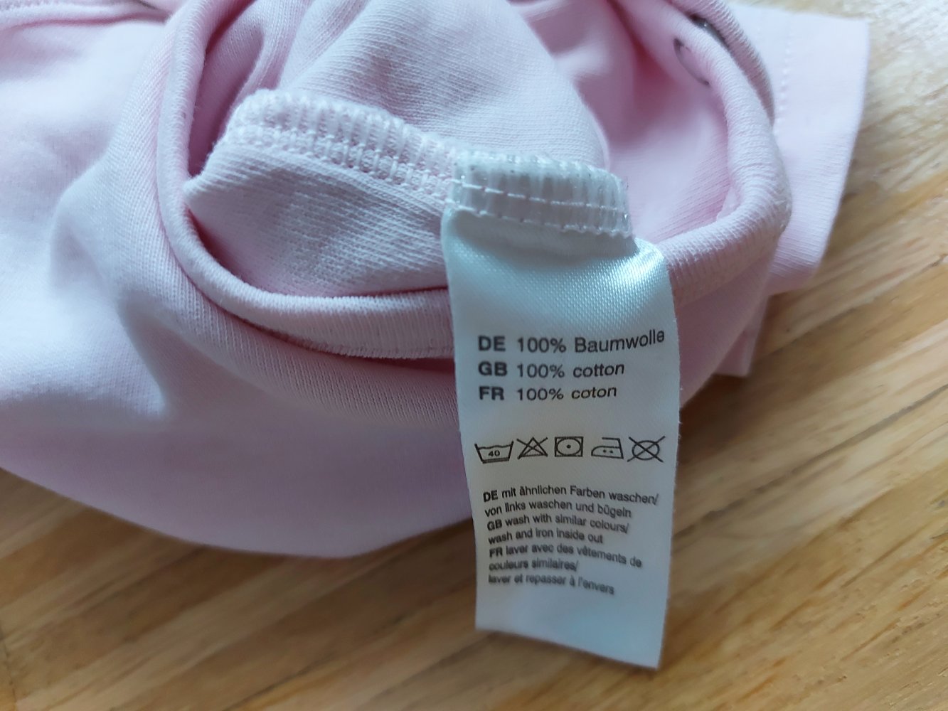 rosa Kurzarmbody mit Wickelschnitt Gr. 50/56 Wickelbody