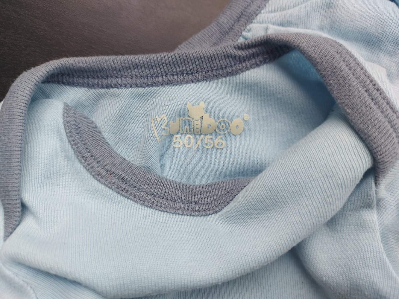 blauer kuniboo Langarmbody Gr. 50/56 