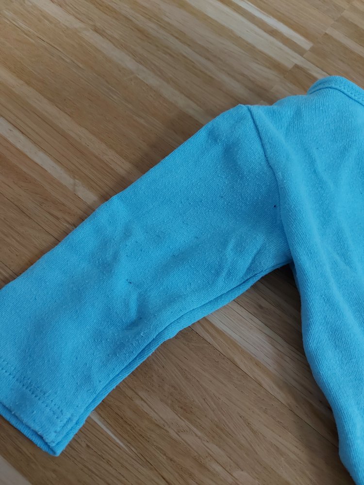 blauer Langarm-Wickelbody mit Elefantenmotiv 