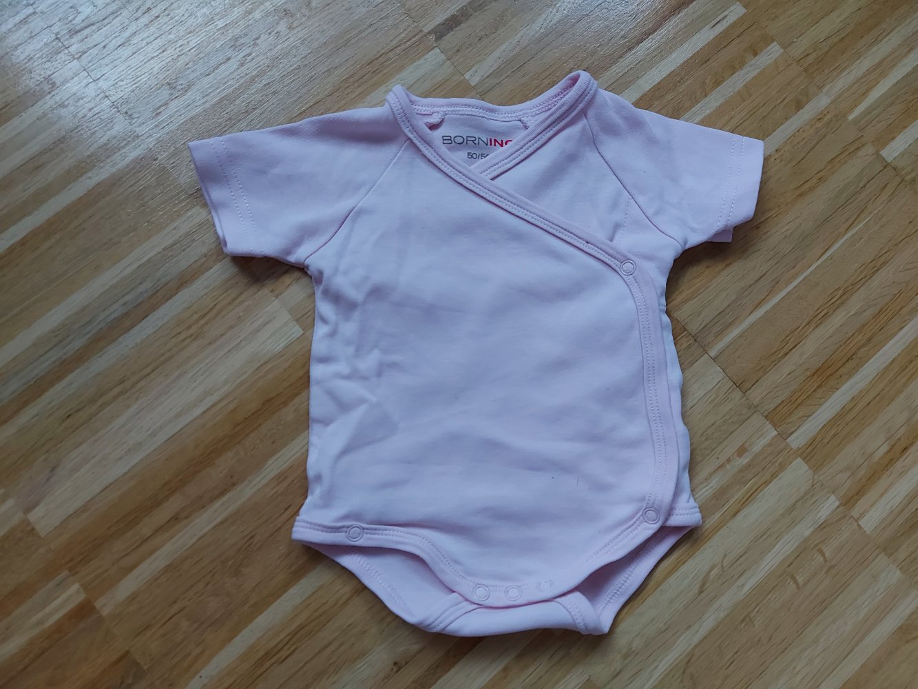 rosa Kurzarmbody mit Wickelschnitt Gr. 50/56 Wickelbody