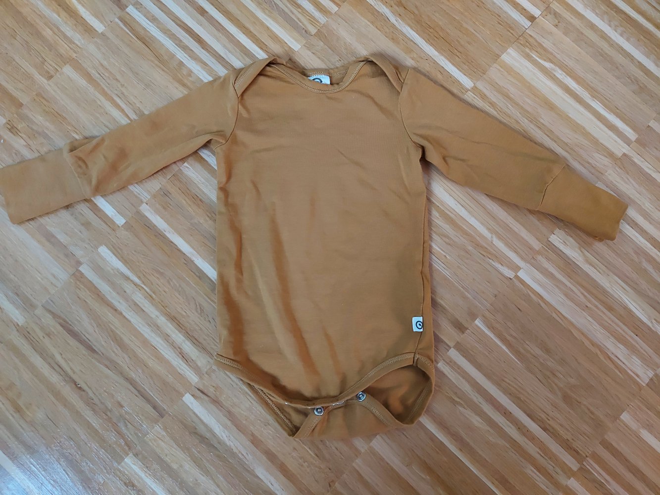 langärmliger senf/ockergelber Babybody Gr. 62 von müsli