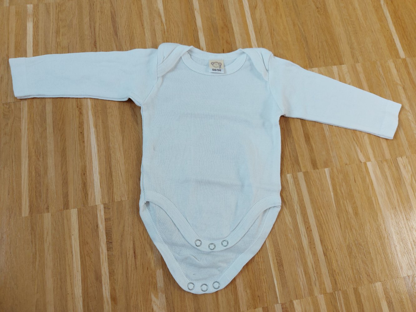 weißer Langarmbody Gr. 50/56