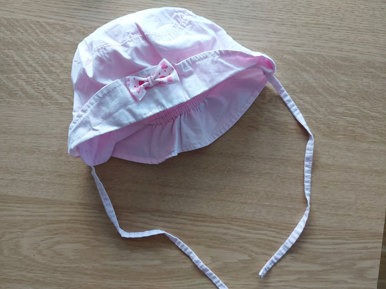 rosa Sommerhut mit Schleife für Babys, Gr. 43-45 mit Schnüren