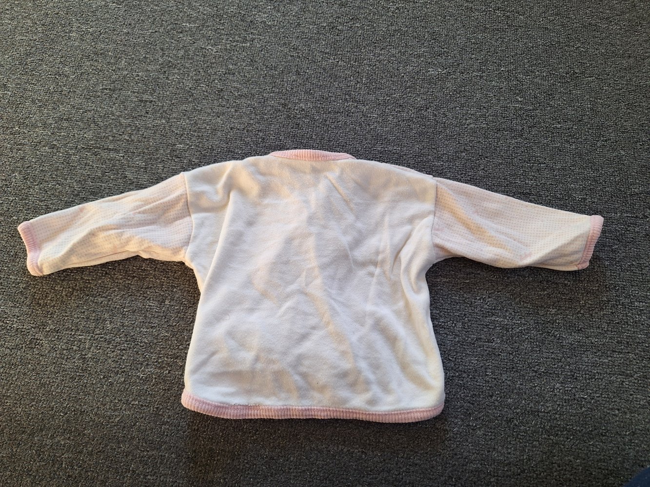 weiß-rosa Wickeljäckchen 