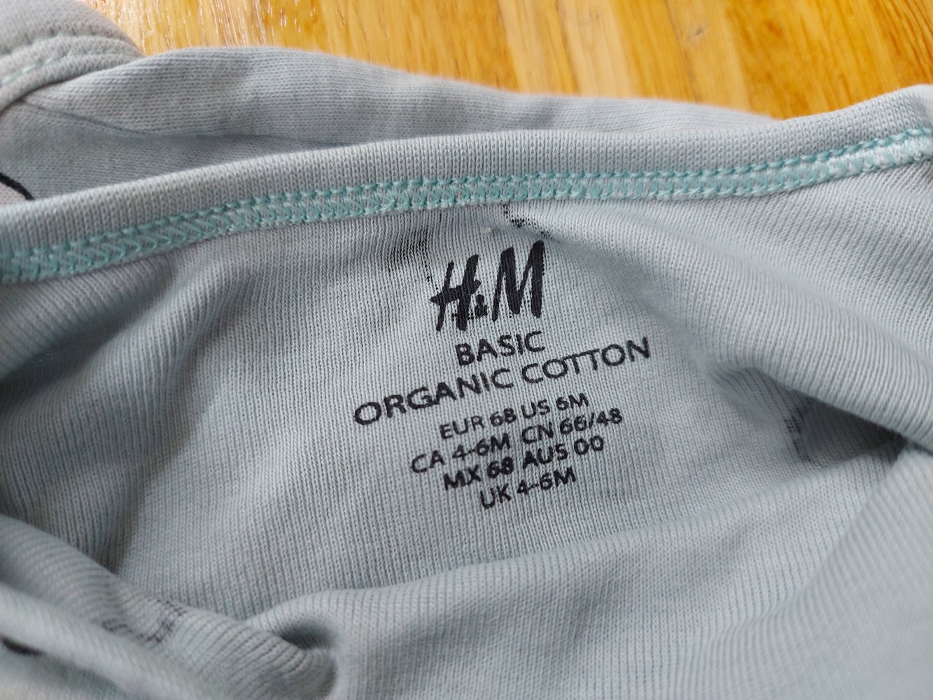 langärmliger türkisfarbener Baby-Body mit süßen Pinguinen, Gr. 68