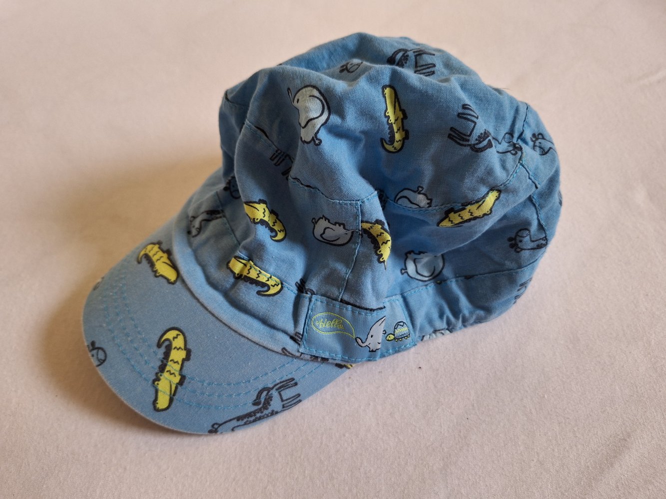 hellblaues Käppi mit Tieren Gr. 86/92 / Sonnenhut mit Schirm
