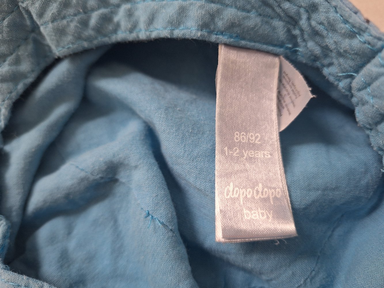 hellblaues Käppi mit Tieren Gr. 86/92 / Sonnenhut mit Schirm